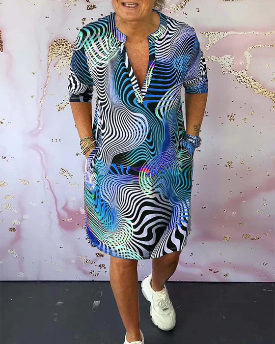 Colourful Printed Dress with V-Neckline Half Sleeves & Pockets