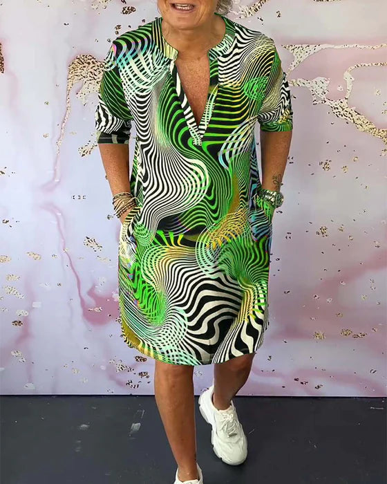 Colourful Printed Dress with V-Neckline Half Sleeves & Pockets