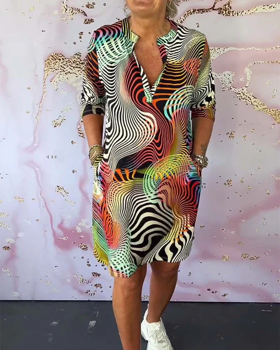 Colourful Printed Dress with V-Neckline Half Sleeves & Pockets