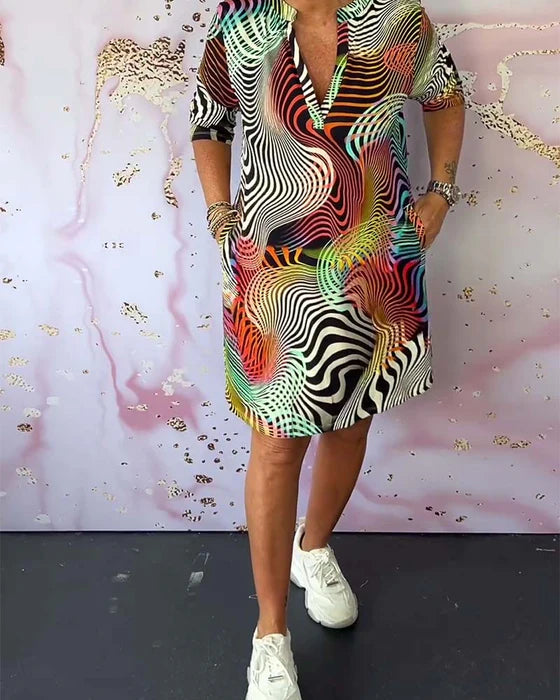 Colourful Printed Dress with V-Neckline Half Sleeves & Pockets