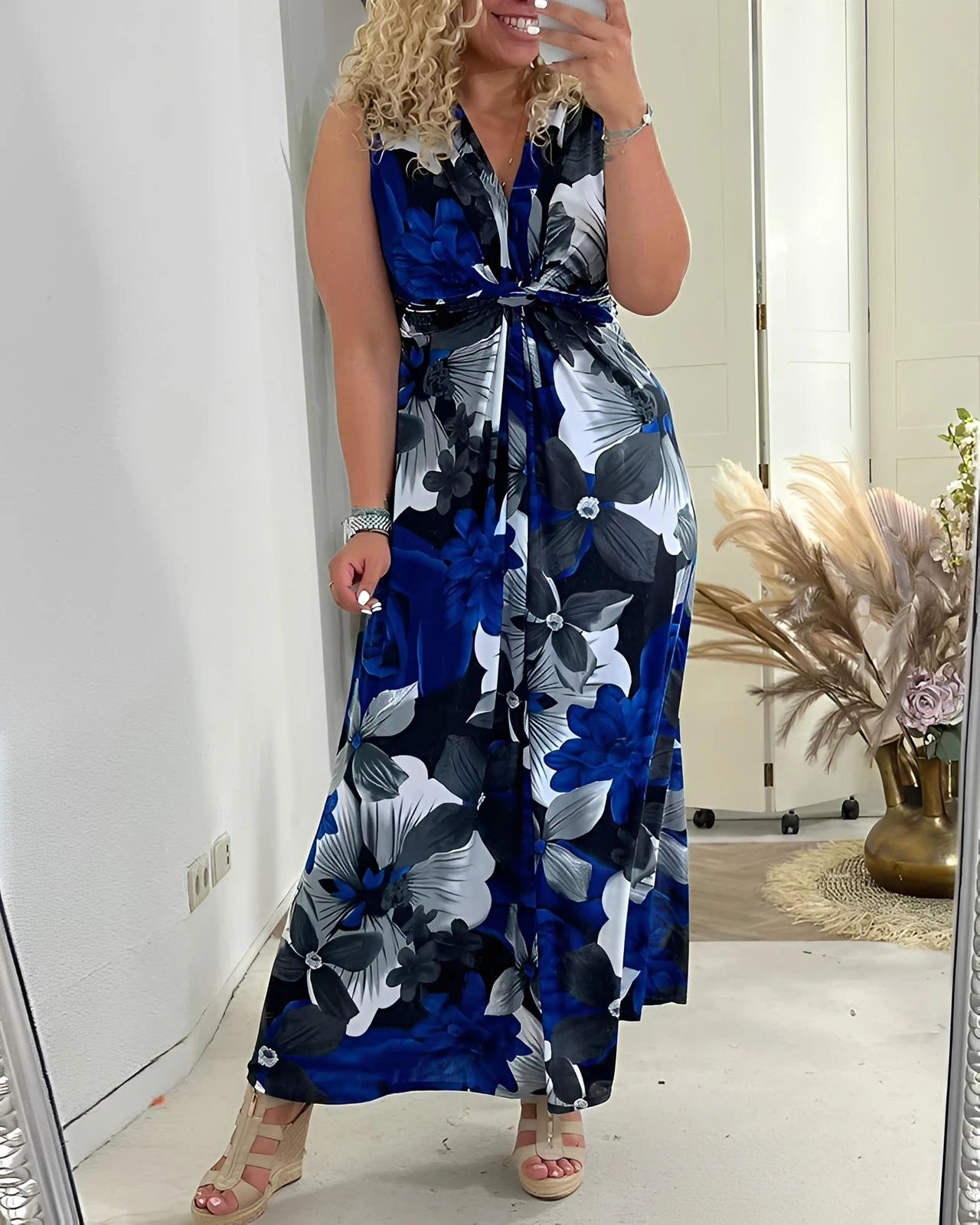 Sleeveless Pleated Floral Midi Dress with Cinched Waist & High Neckline